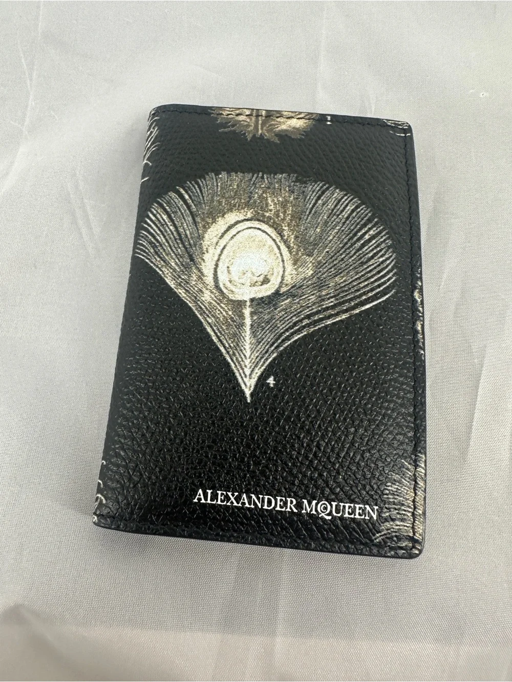 Alexander McQueen black feather bifold walket